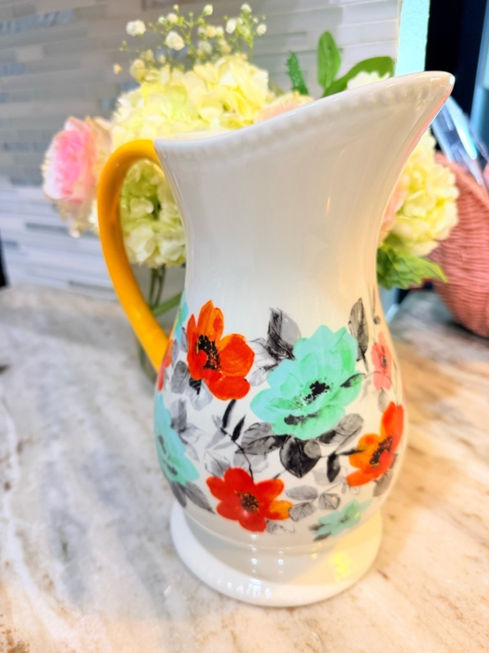 Floral Ceramic Pitcher in White with Yellow Handle